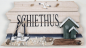 Preview: Maritimes Türschild "Schiethus" Dekoratives Hängeschild aus Holz mit Kordel zum Aufhängen und mit maritimen Accessoires verziert. Maße: Breite 22cm; Höhe 12,5cm; Tiefe 2,5cm Gesamthöhe ( mit Kordel ) ca. 19cm. Farbe: antik weiß